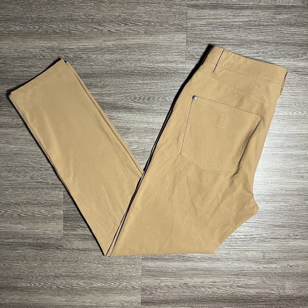 Vuori Meta Pants Men's 31 Camel Athletic Slim Tapered Stretch Performance V430